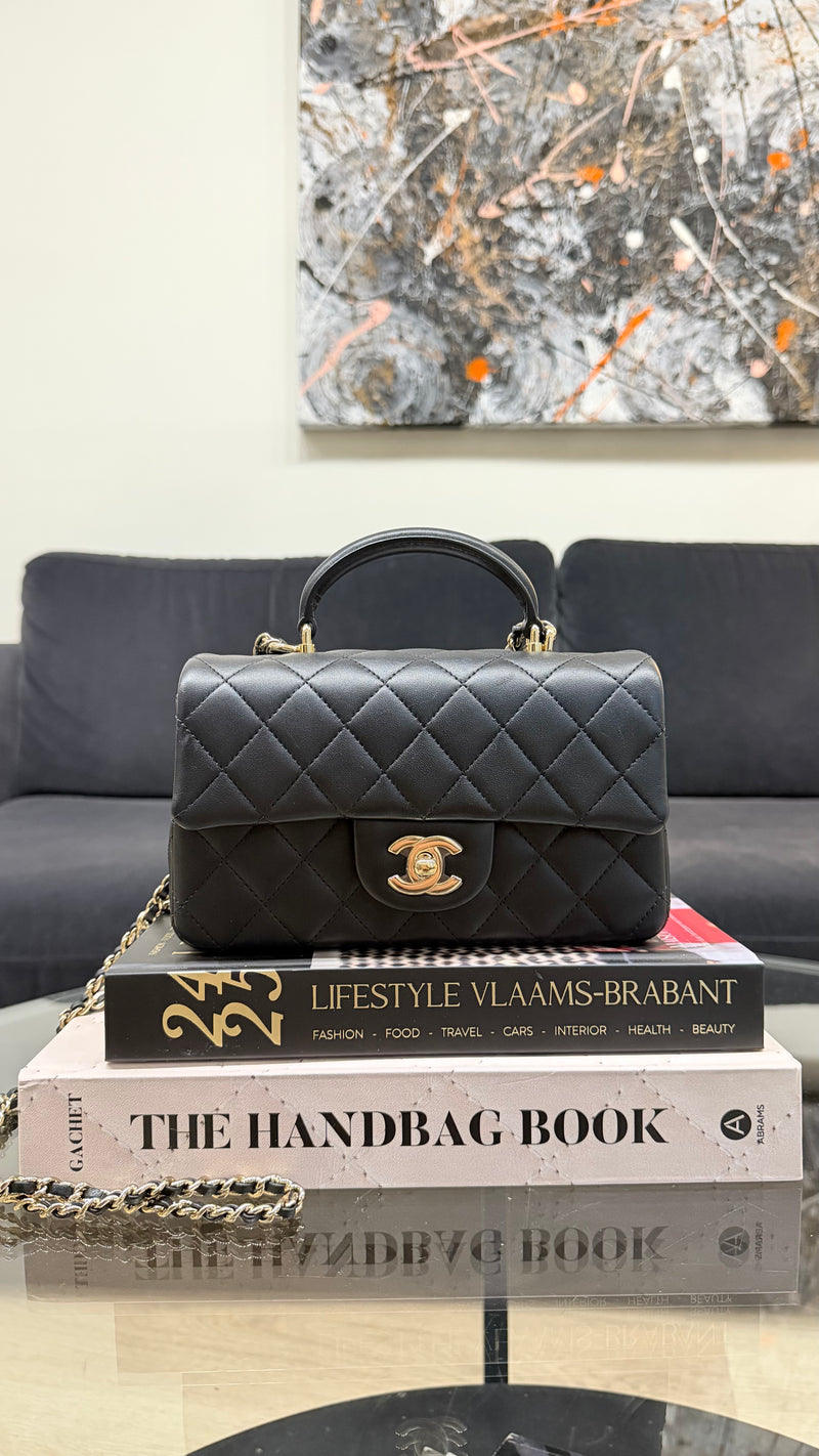 Chanel top handle black handbag