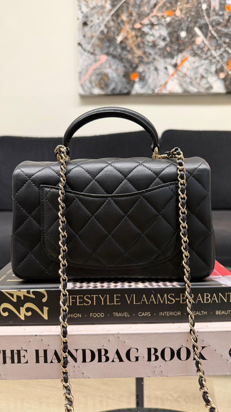 Chanel top handle black handbag